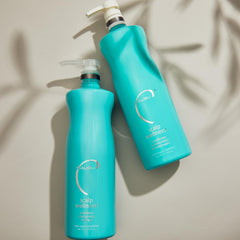 Malibu C label closeup showcasing sulfate-free, vegan formula.