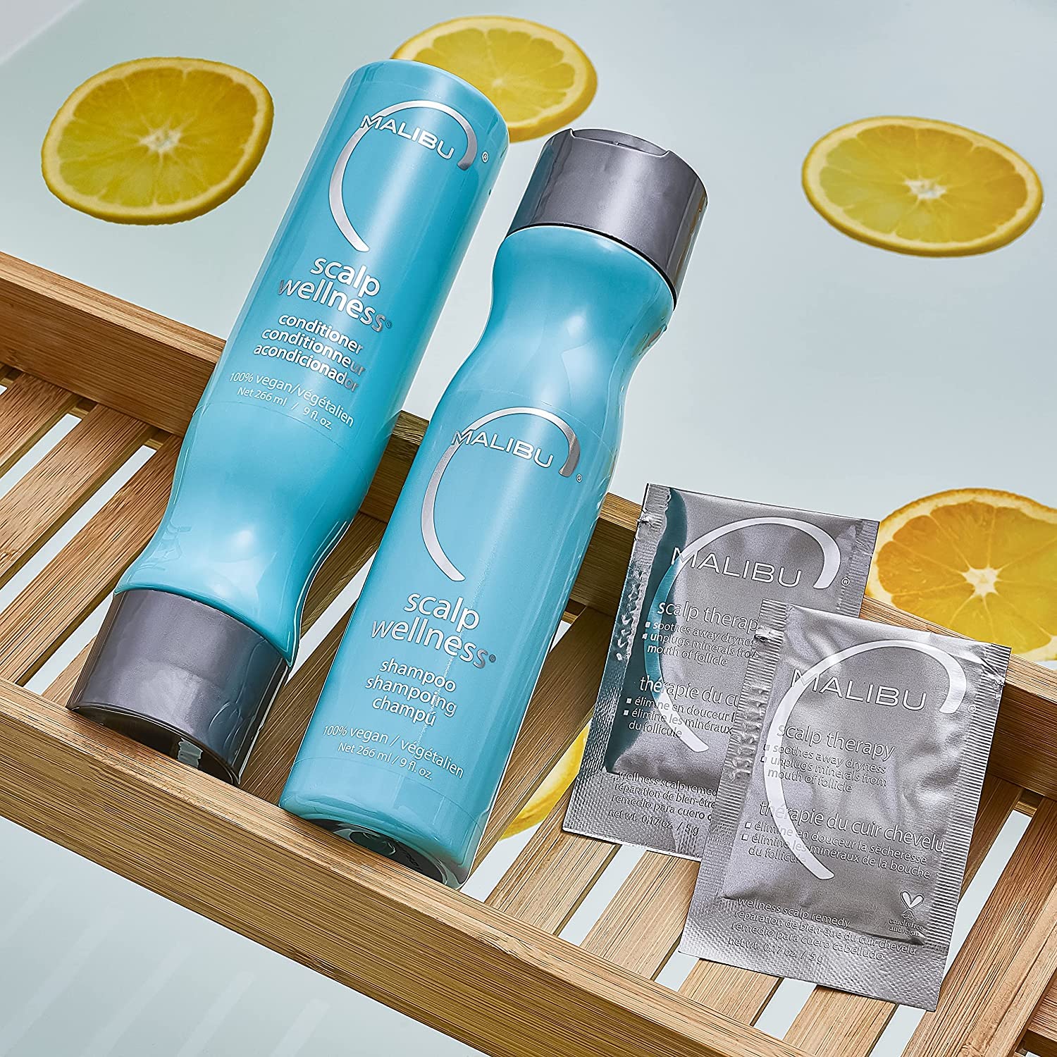 Malibu C Scalp Wellness Shampoo tub open with product texture.