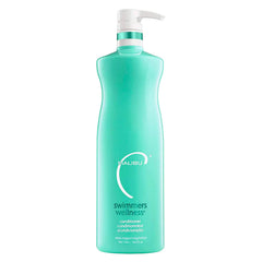Malibu C Swimmers Wellness conditioner bottle pour supports easy application and hydration.
