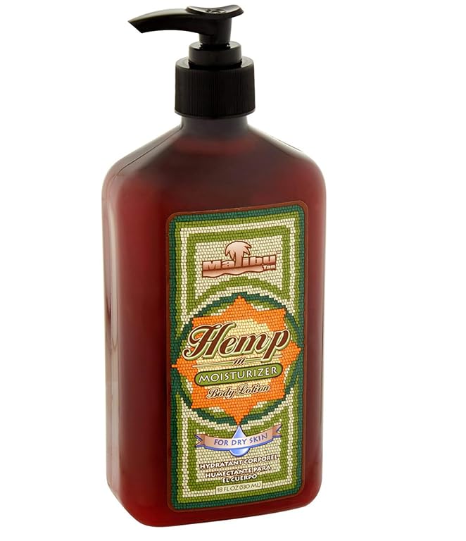 Malibu Tan Body Lotion being applied on arm for moisturized skin.