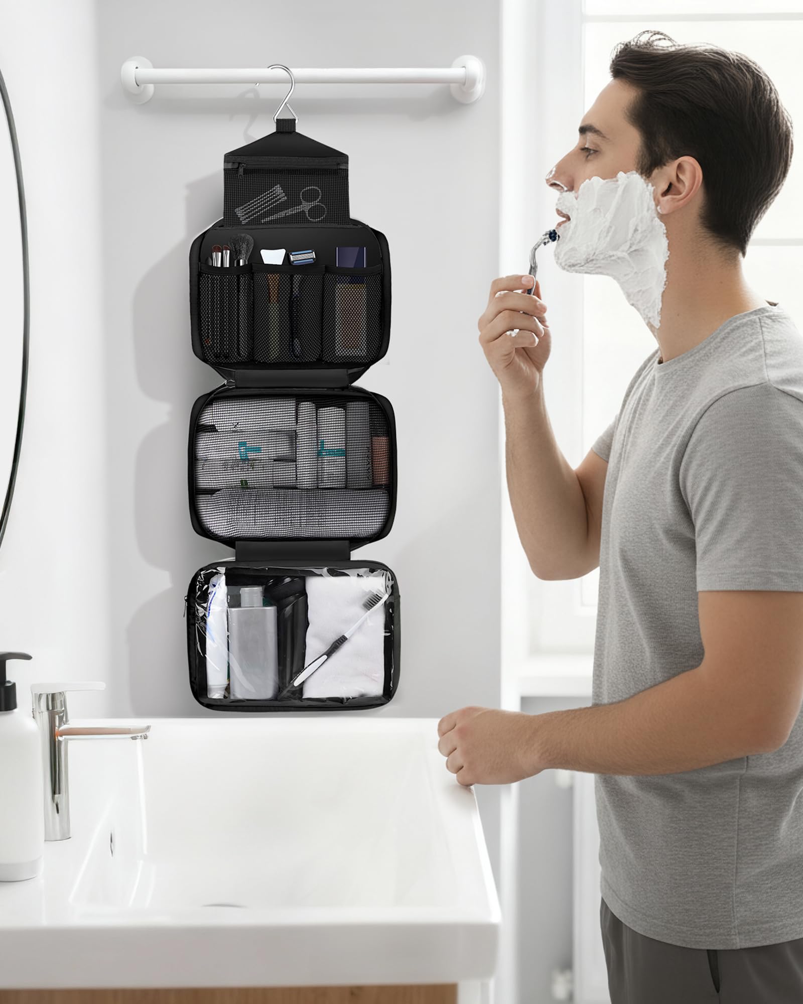 Maliton toiletry bag hanging in shower demonstrates easy access to essentials during travel.