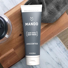 Mando Odor Shield in a shower setup conveying 24-hour odor protection