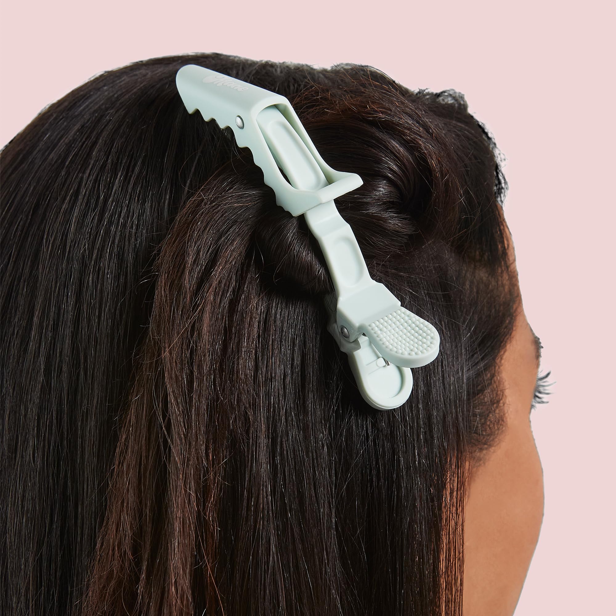 Mane All Grip No Slip teal and pink set on dresser ready for quick styling prep
