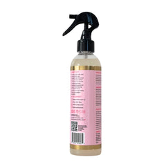 The Mane Attraction Nourishing Daily Hair Growth Moisture Mist hair tips demonstrates smooth frizz-taming application