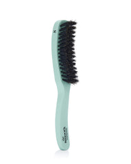 Mane Master curved brush closeup by Smooth Stick softens frizz with premium boar bristles.