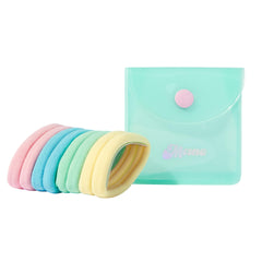 Mane Rainbow fabric hair ties case open reveal, showcasing color-assorted bands for easy travel organization.