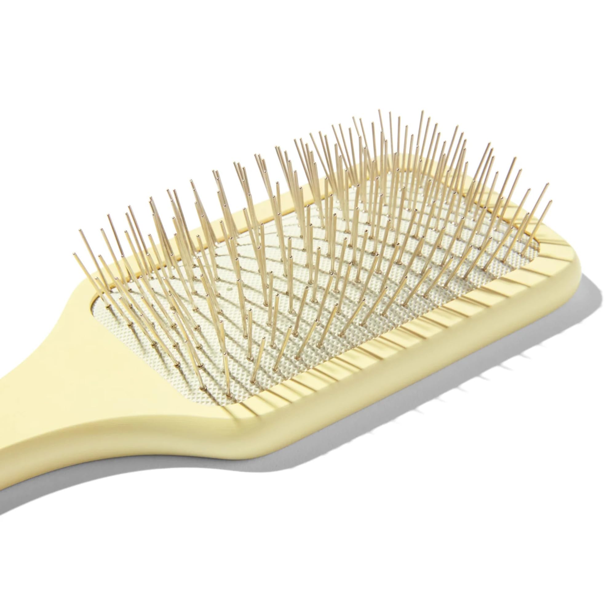 Mane Ready or Knot brush performing scalp massage during styling