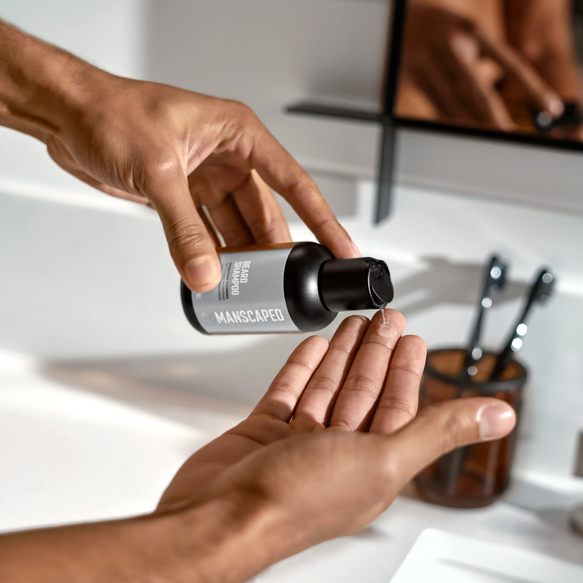 MANSCAPED Beard Conditioner bottle nourishes and softens while hydrating skin underneath.