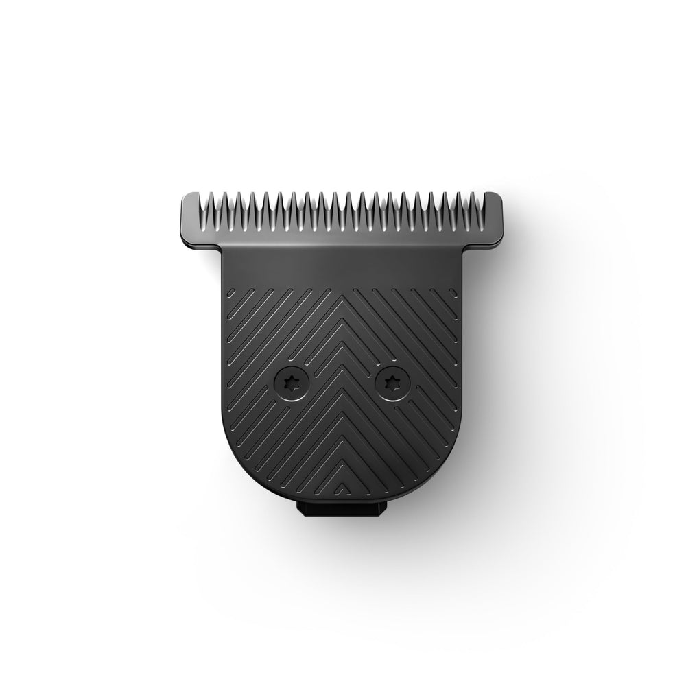 MANSCAPED Beard Hedger blade being cleaned to remove dirt and oil buildup.
