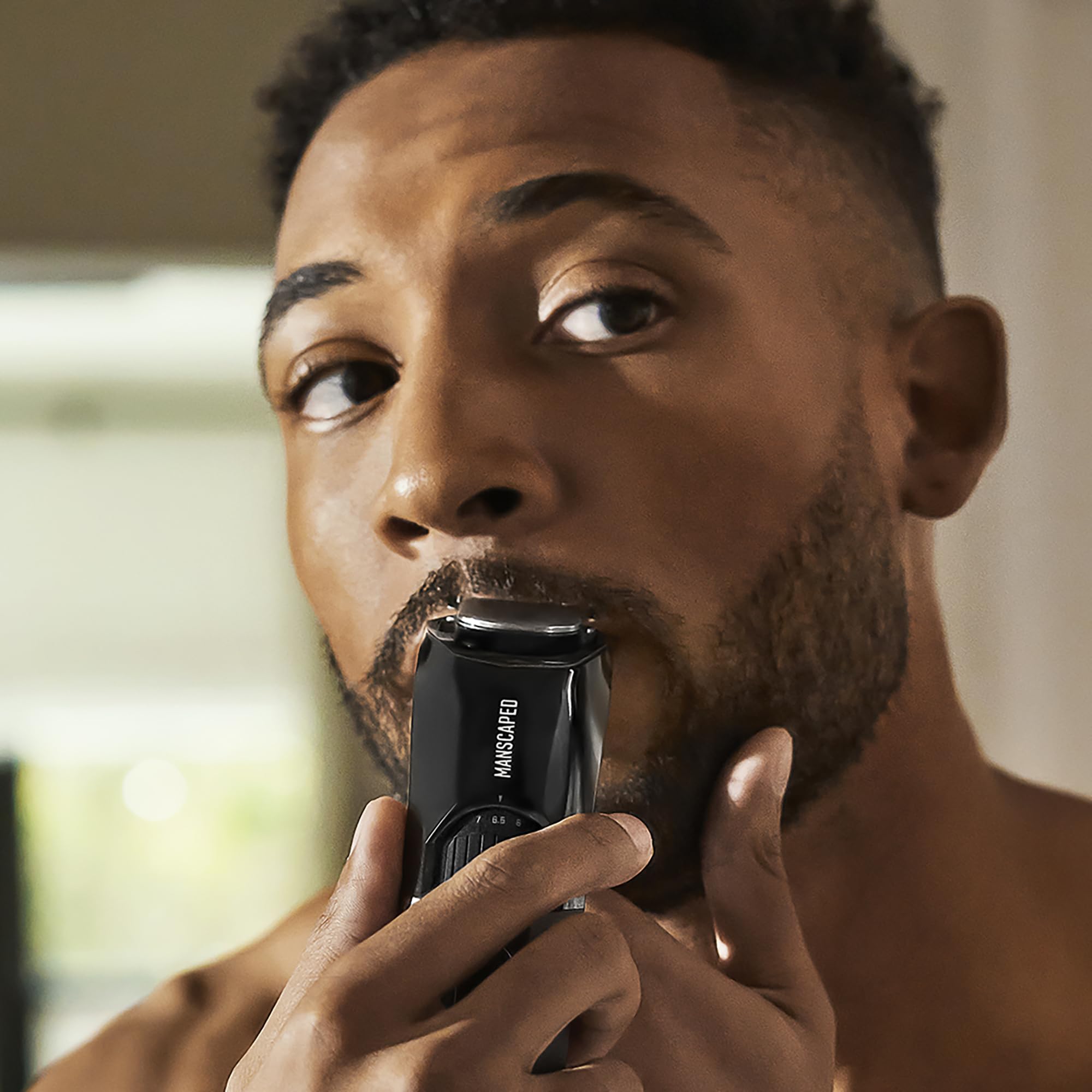 MANSCAPED SkinSafe 41mm blade detail highlighting precision edges.