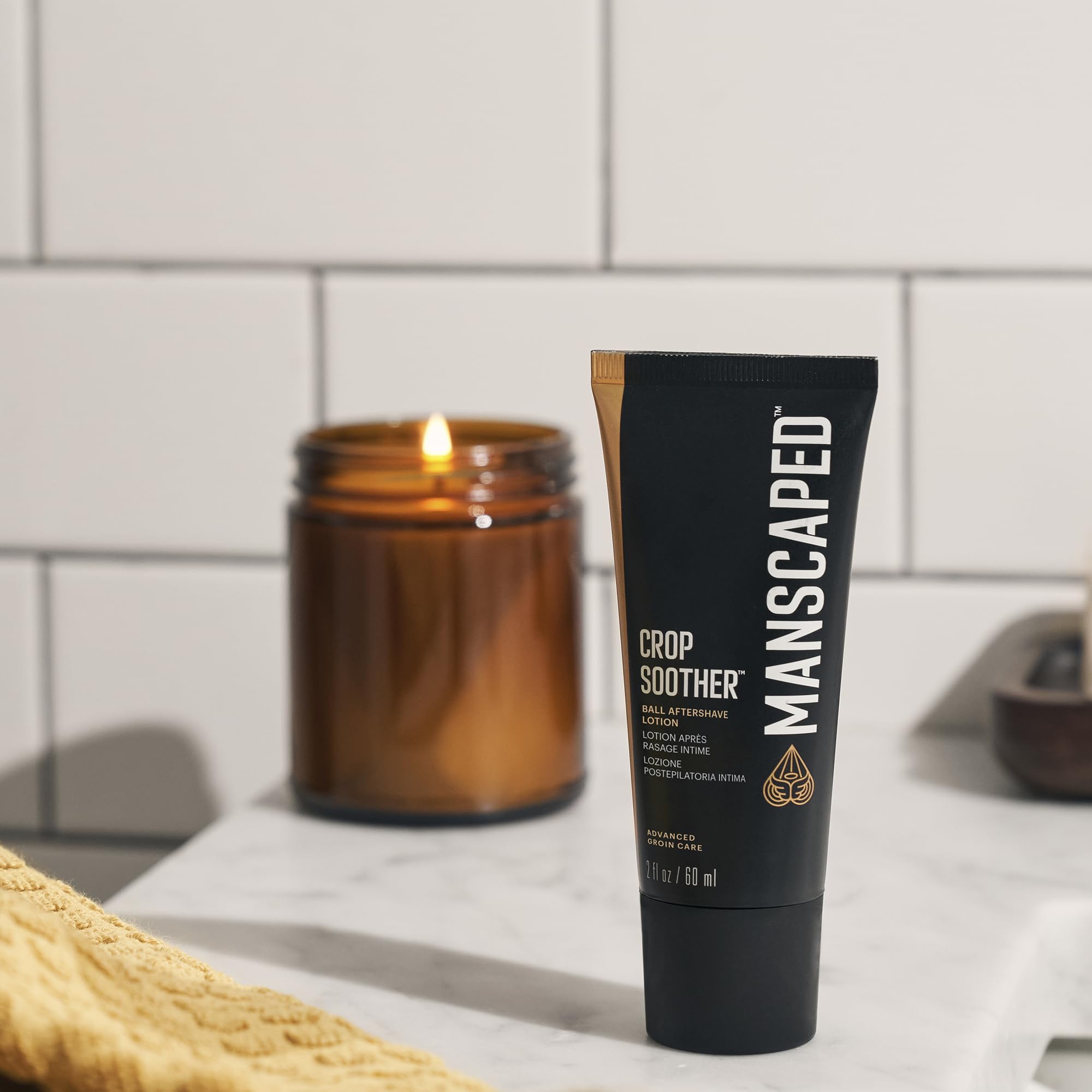 MANSCAPED Crop Soother ingredients swirl emphasizes aloe and oats for calm skin.