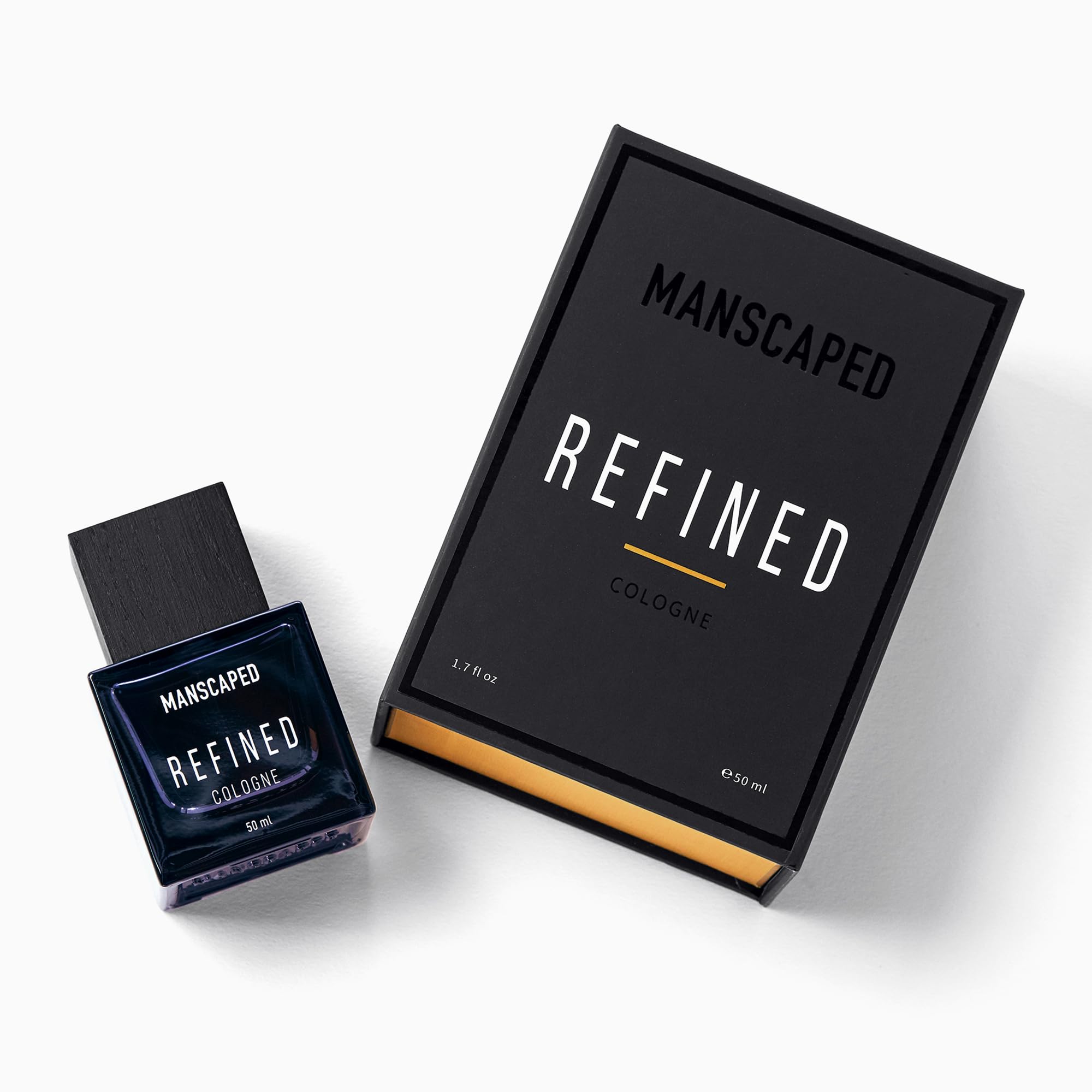 MANSCAPED Refined bottle in gym bag, ready for post-workout refresh.