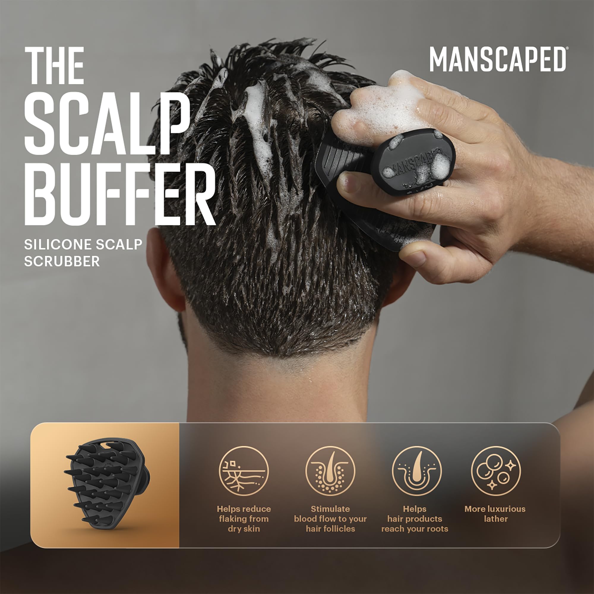 MANSCAPED Scalp Buffer handheld grip demonstrates secure non-slip use in the shower.