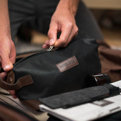 MANSCAPED Shed bag interior showing lined space for tools and bottles.