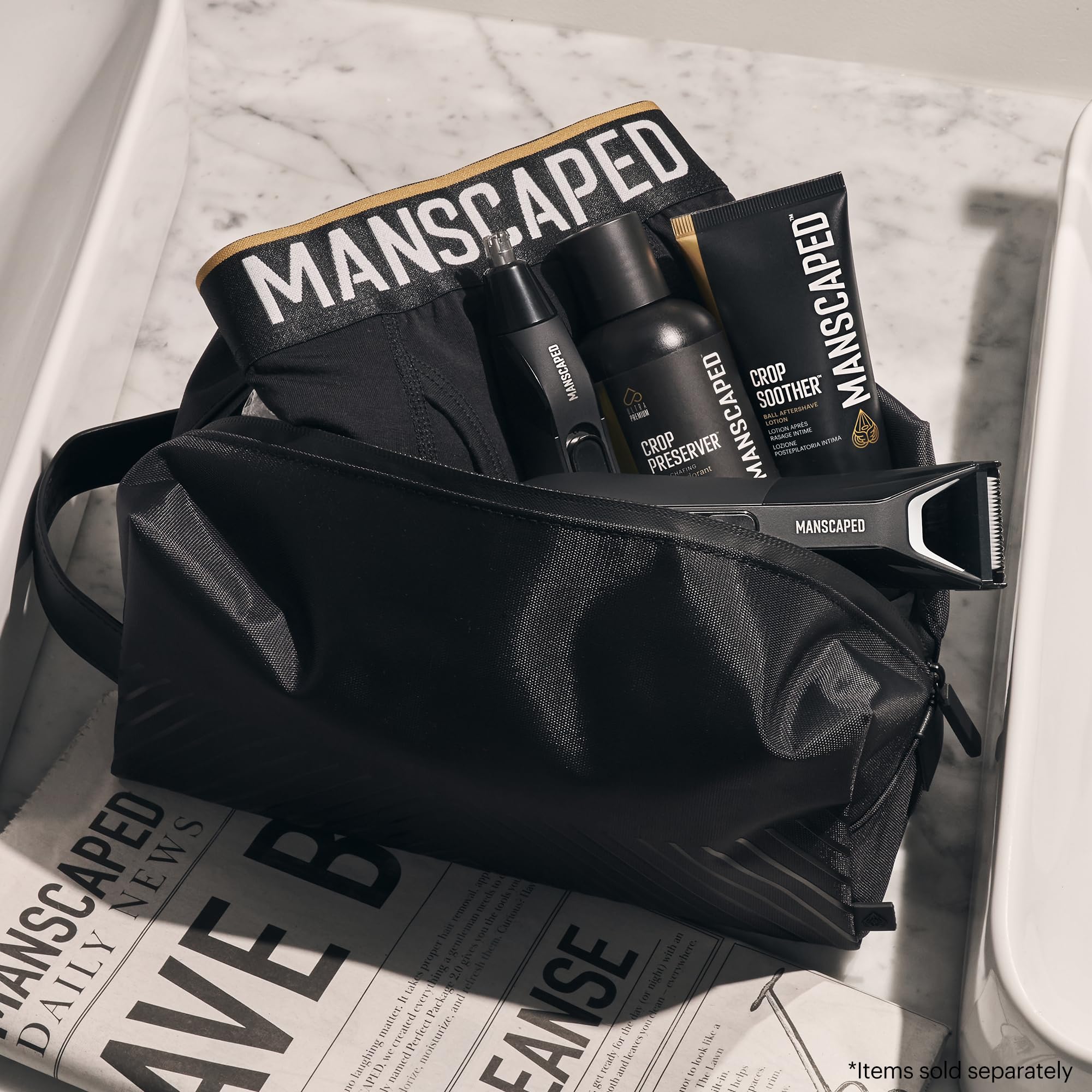 MANSCAPED The Shed 2.0 open compartment demonstrates organized internal pockets for essentials