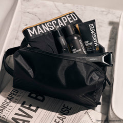 MANSCAPED The Shed 2.0 open compartment demonstrates organized internal pockets for essentials