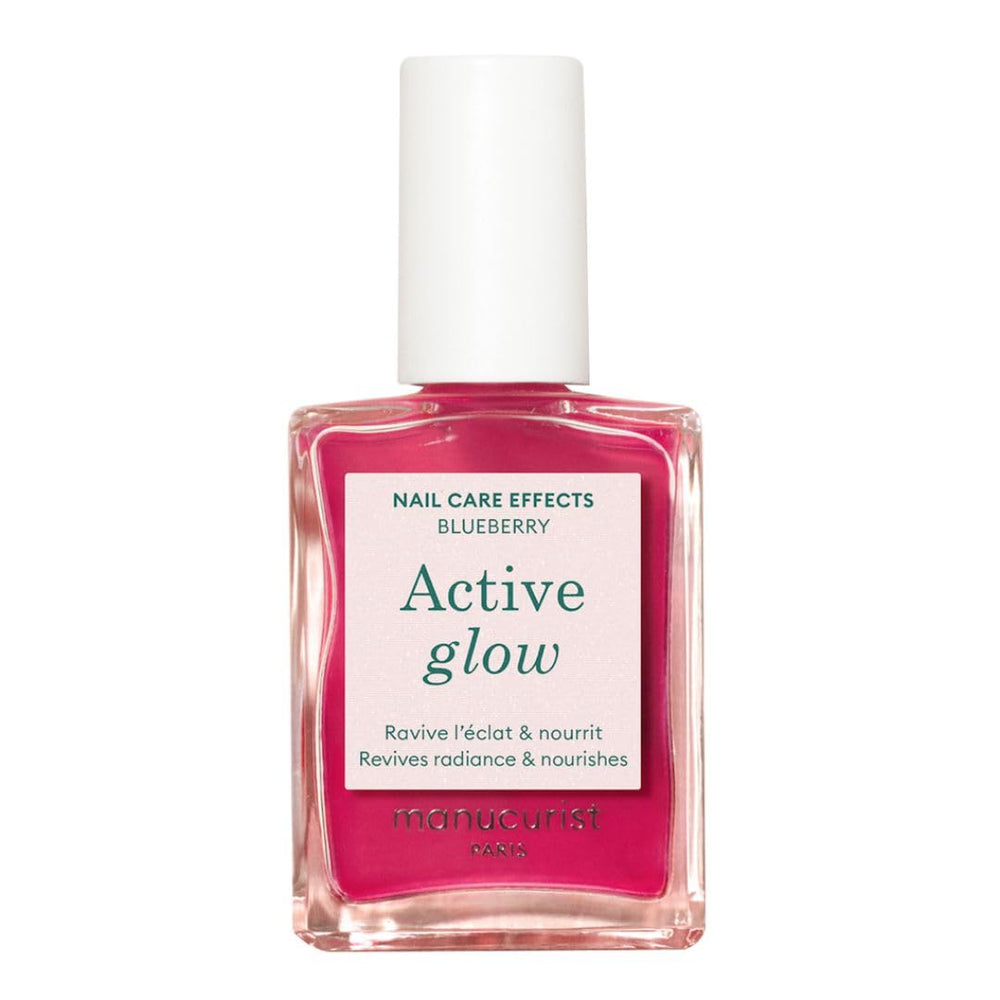 Manucurist Active Glow Blueberry bottle close-up showing mirror-like shine and sheer cool-rose glow.