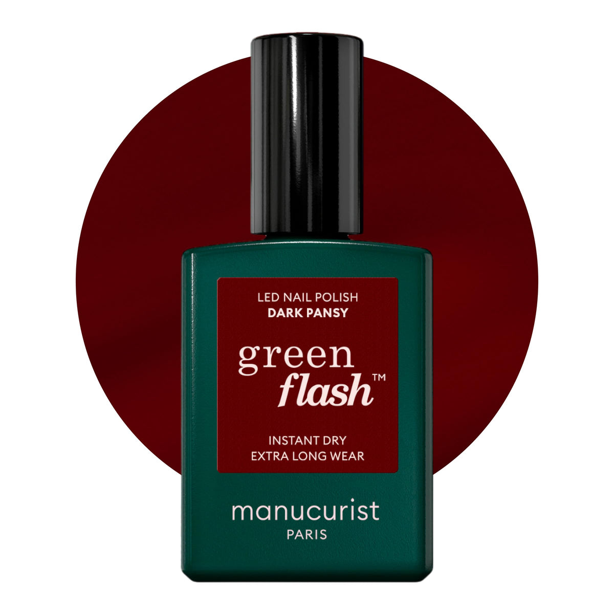 Manucurist Green Flash Dark Pansy bottle closeup, vegan plant-based gel polish for burgundy nails.