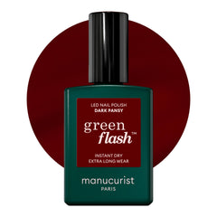 Manucurist Green Flash Dark Pansy bottle closeup, vegan plant-based gel polish for burgundy nails.