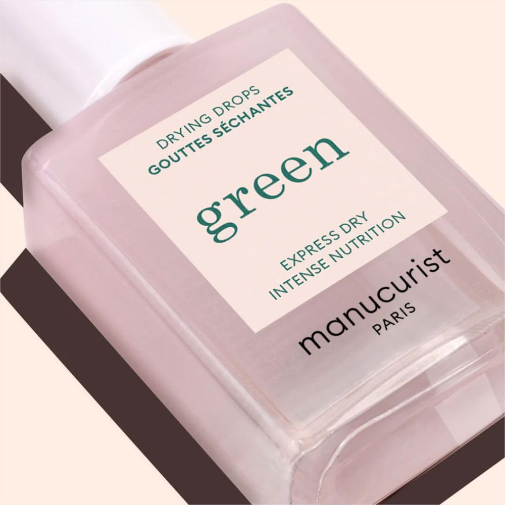 Manucurist Green Drying Drops on display emphasizing Green System compatibility