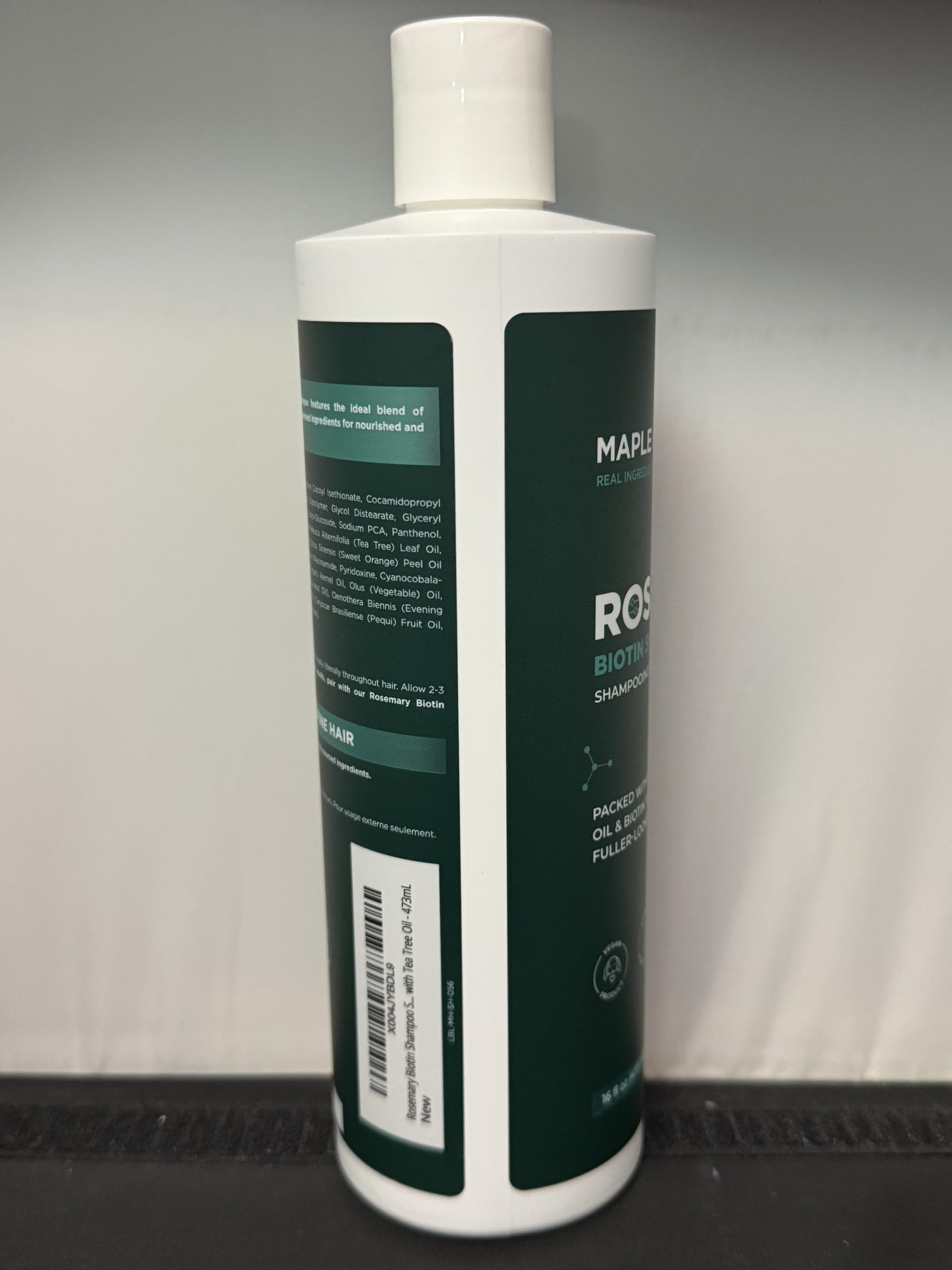Maple Holistics paraben-free shampoo bottle highlights gentle cleansing formula.