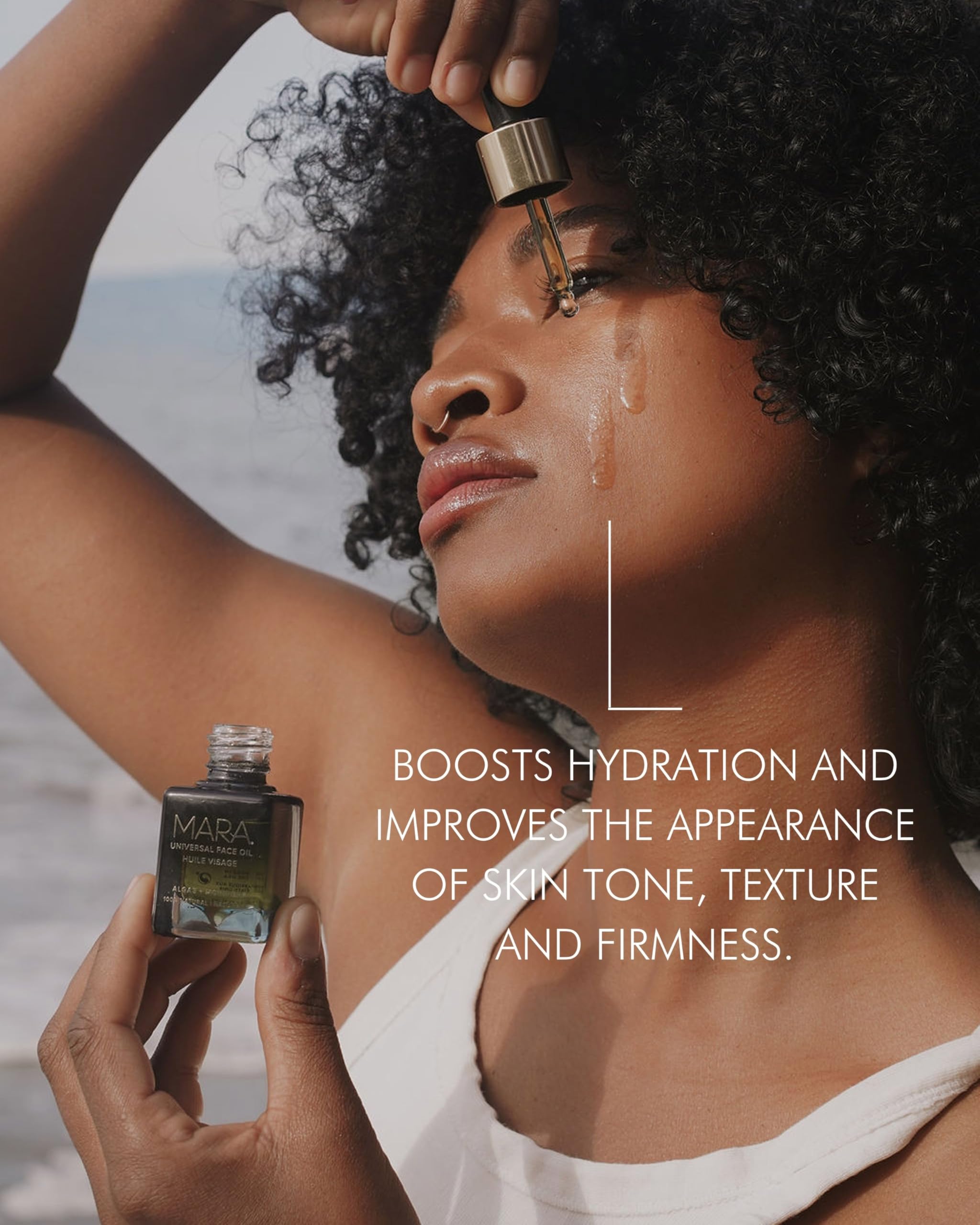 MARA Universal Hydrating Face Oil application hand shows easy, soothing skincare