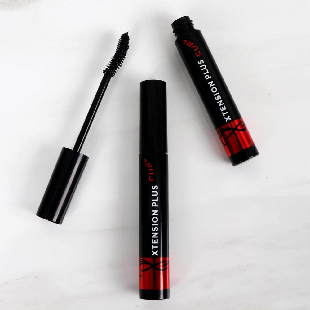 Marcelle Xtension Plus Curl Mascara closeup of lengthened lashes for everyday definition.