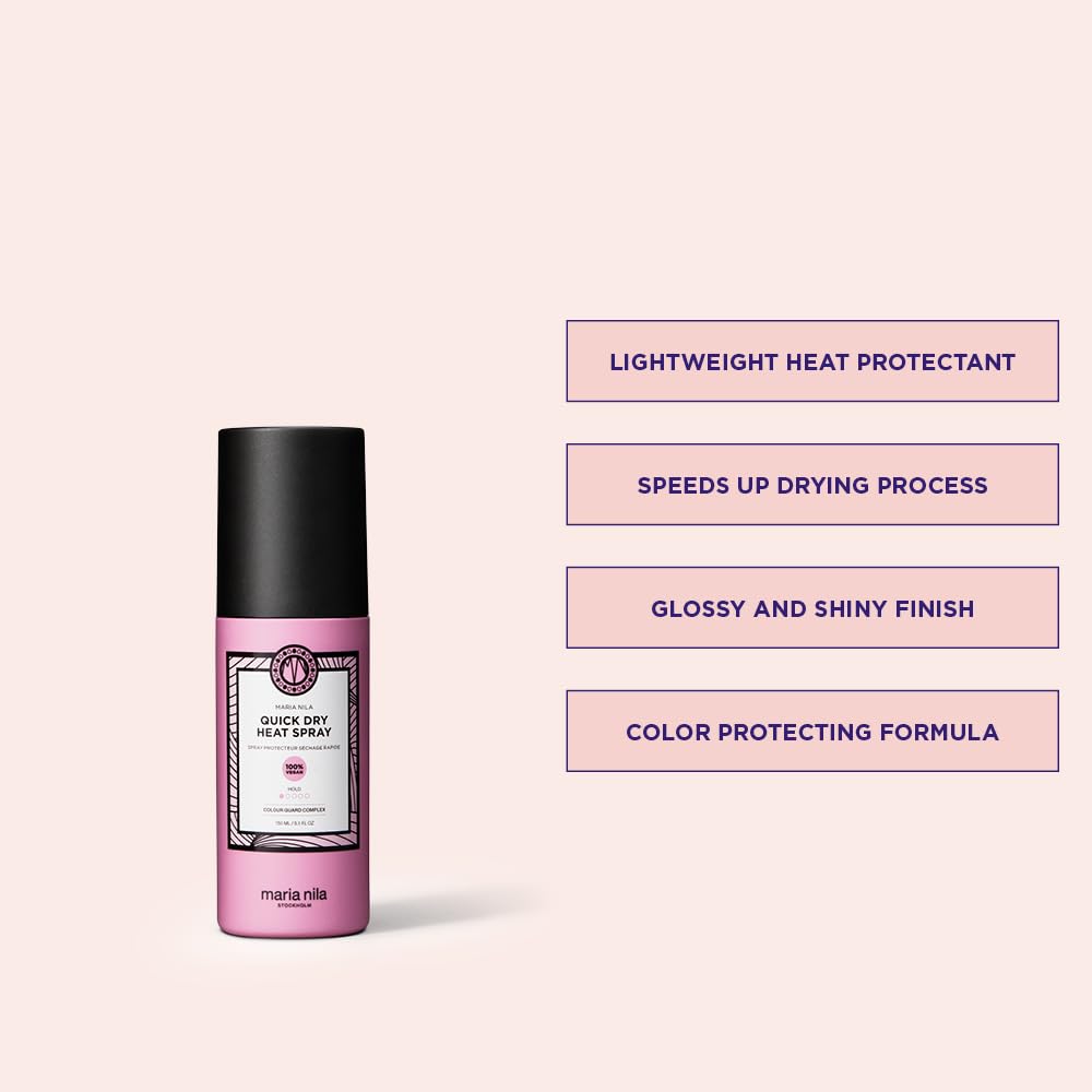 Maria Nila Quick Dry Heat Spray mist applied to hair for accelerated drying.