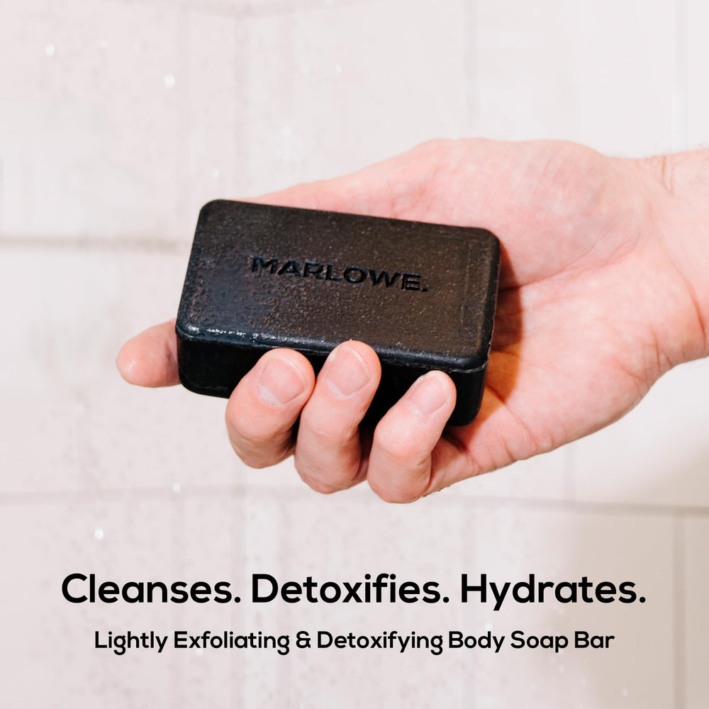 MARLOWE charcoal soap foam close-up highlighting rich lather and purifying cleanse.
