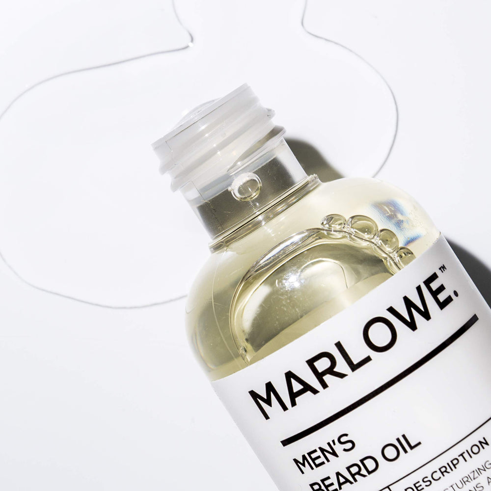 MARLOWE No. 143 Beard Oil close-up label highlights natural conditioning ingredients.