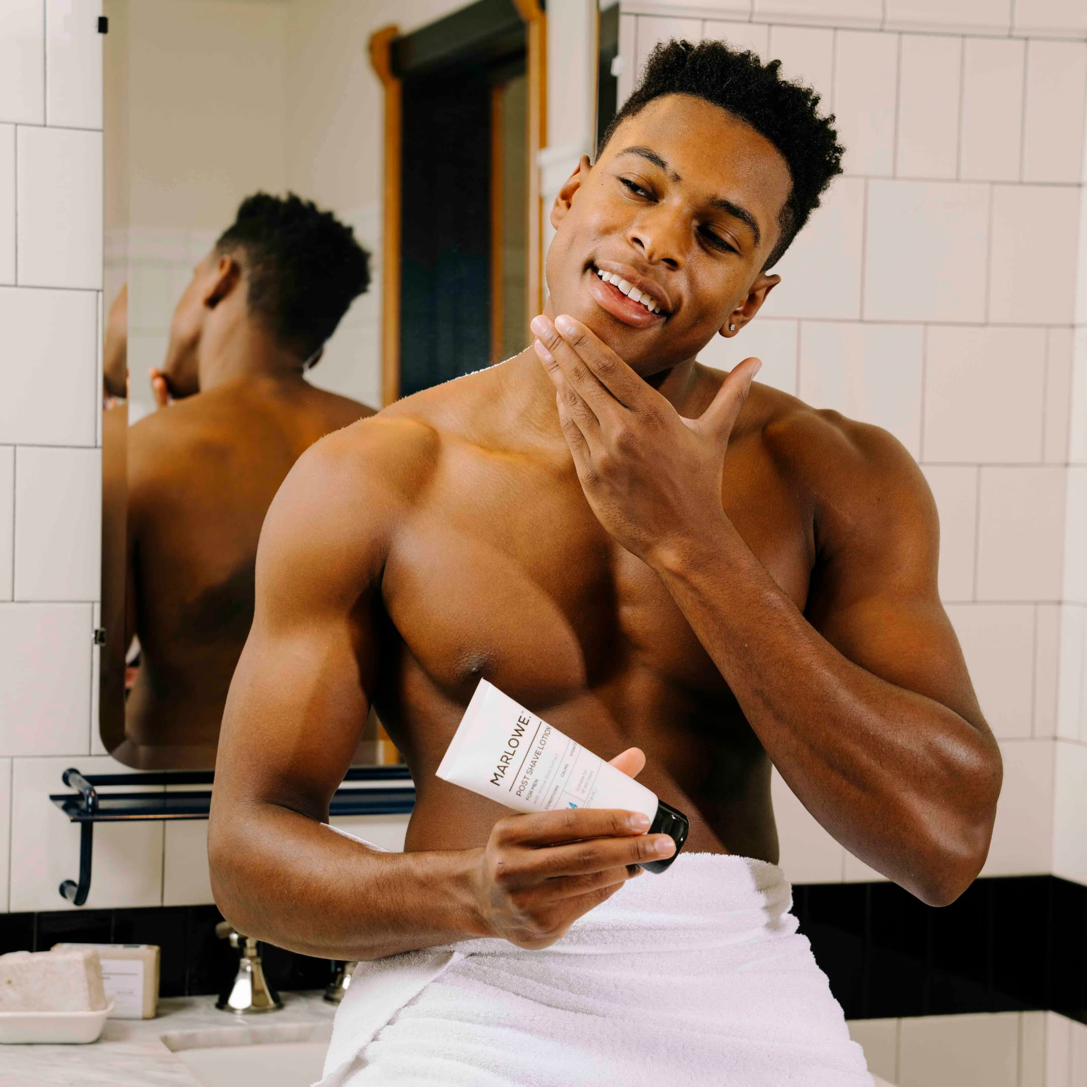 MARLOWE No.144 application shot shows easy massage for refreshed skin post-shave