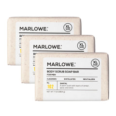 MARLOWE. No. 102 Santal scrub bar closeup showing gritty exfoliation for smoother skin