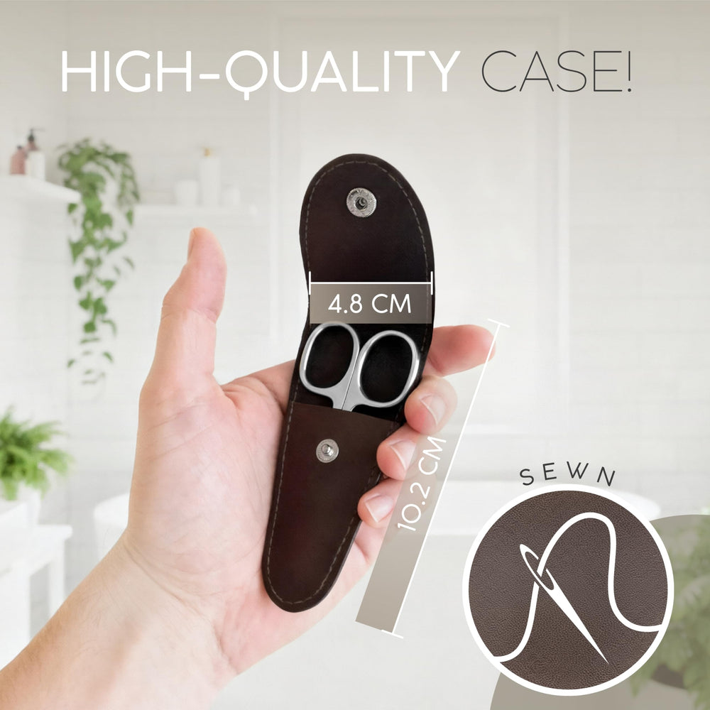 marQus Solingen curved cuticle scissors used for precise eyebrow grooming.