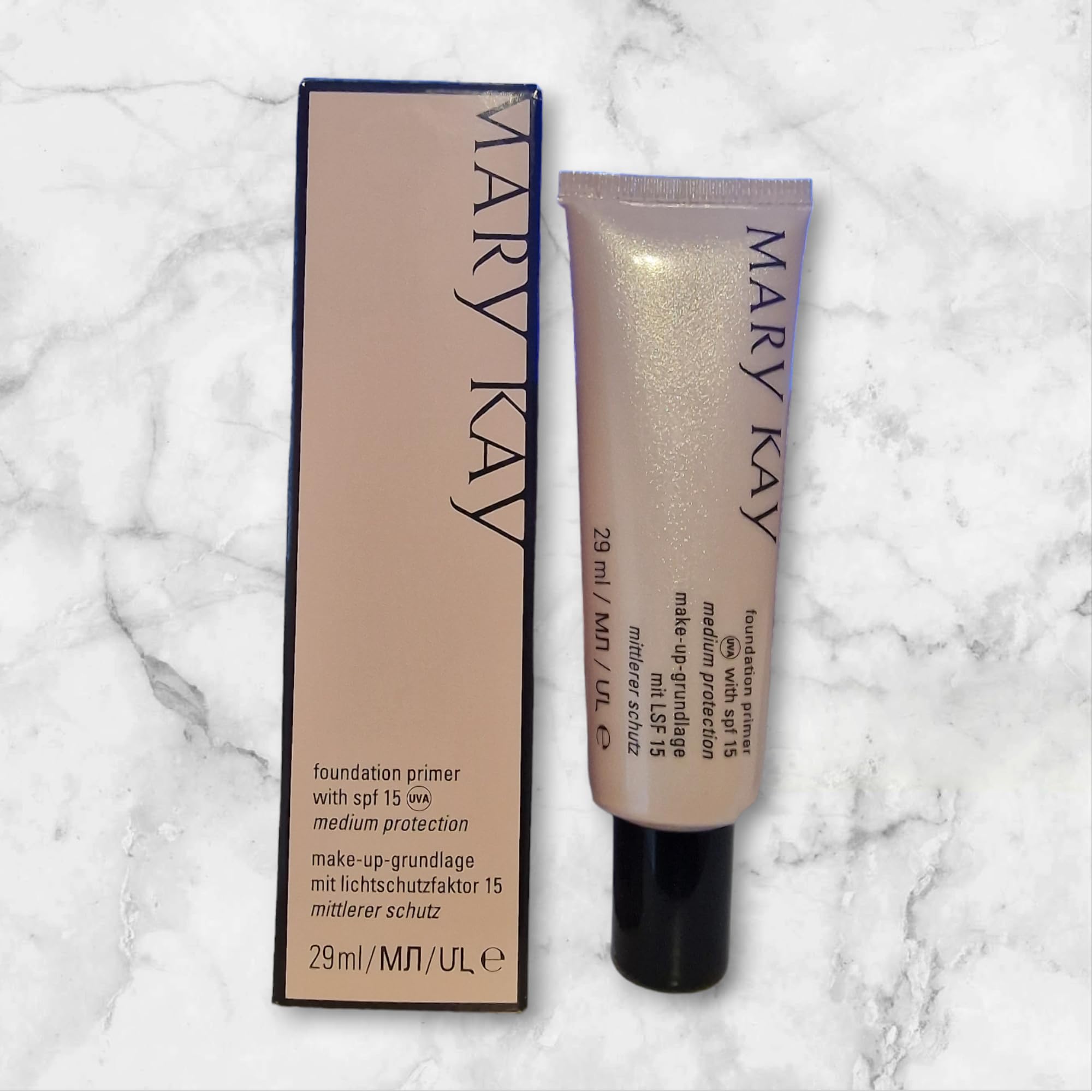 Mary Kay Foundation Primer SPF 15 application image shows lightweight formula for a flawless finish