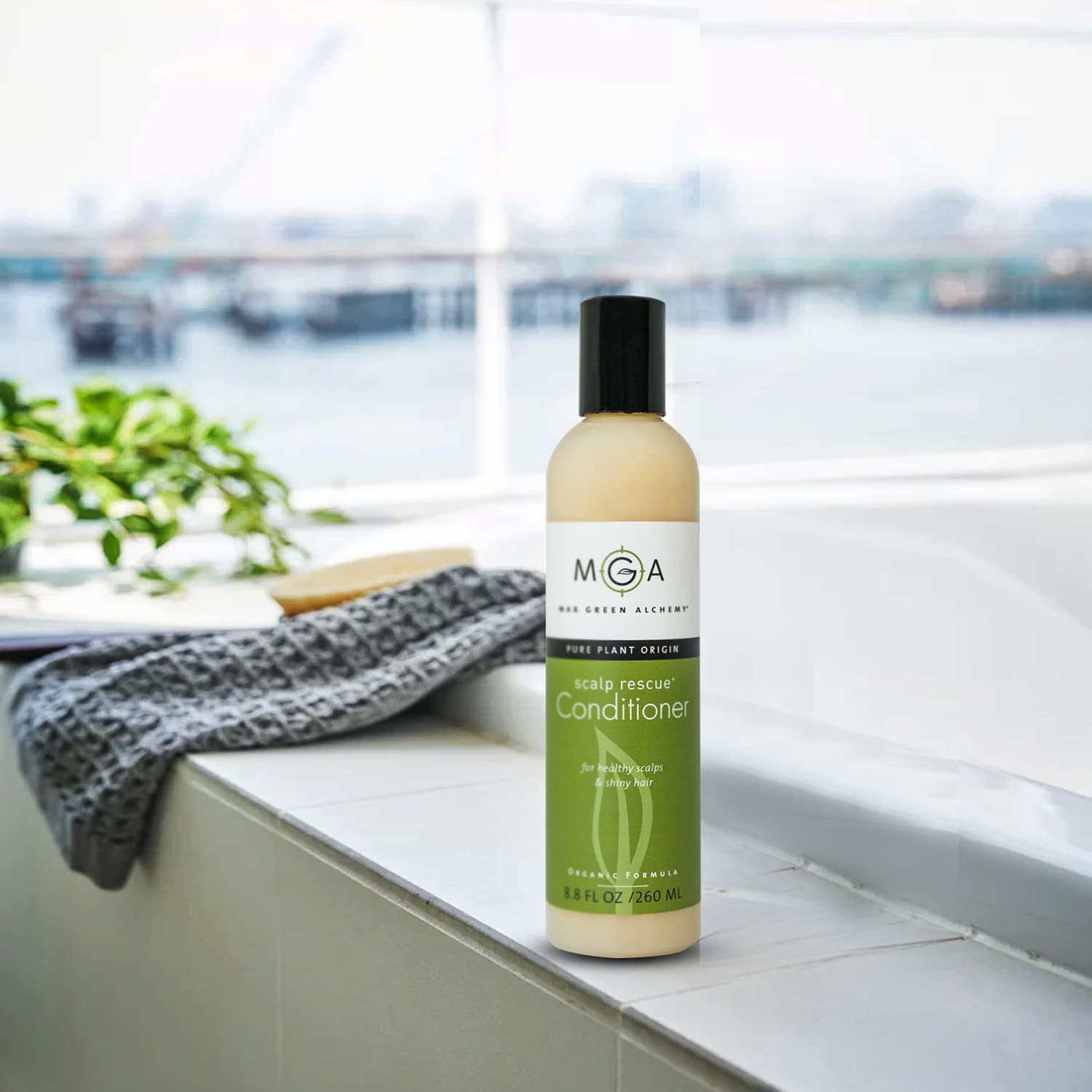 MGA Vegan Hair Conditioner bottle on a clean surface with minimalistic branding.