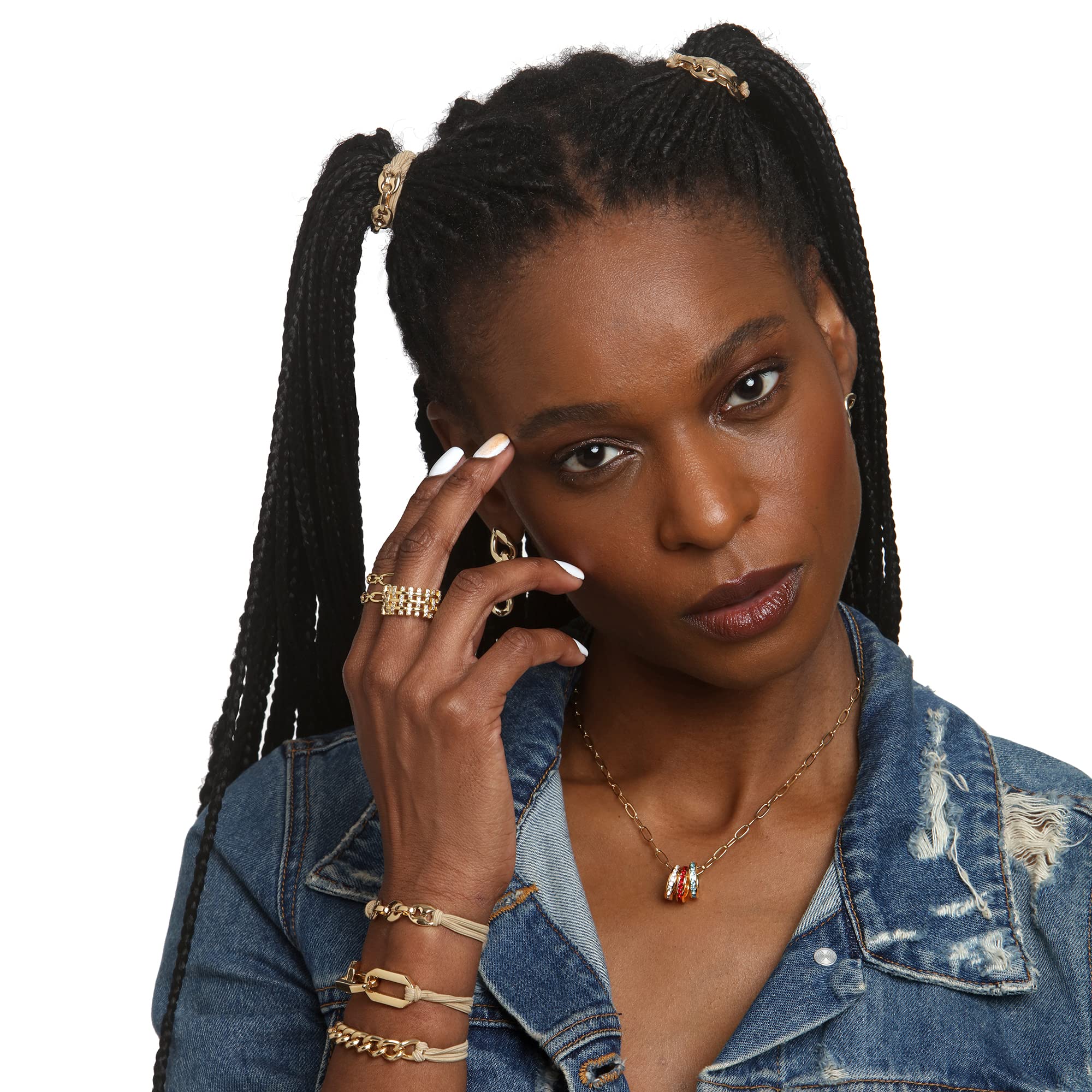 Maya J hair-tie bracelet on bun, smooth metallic finish keeps hair secure