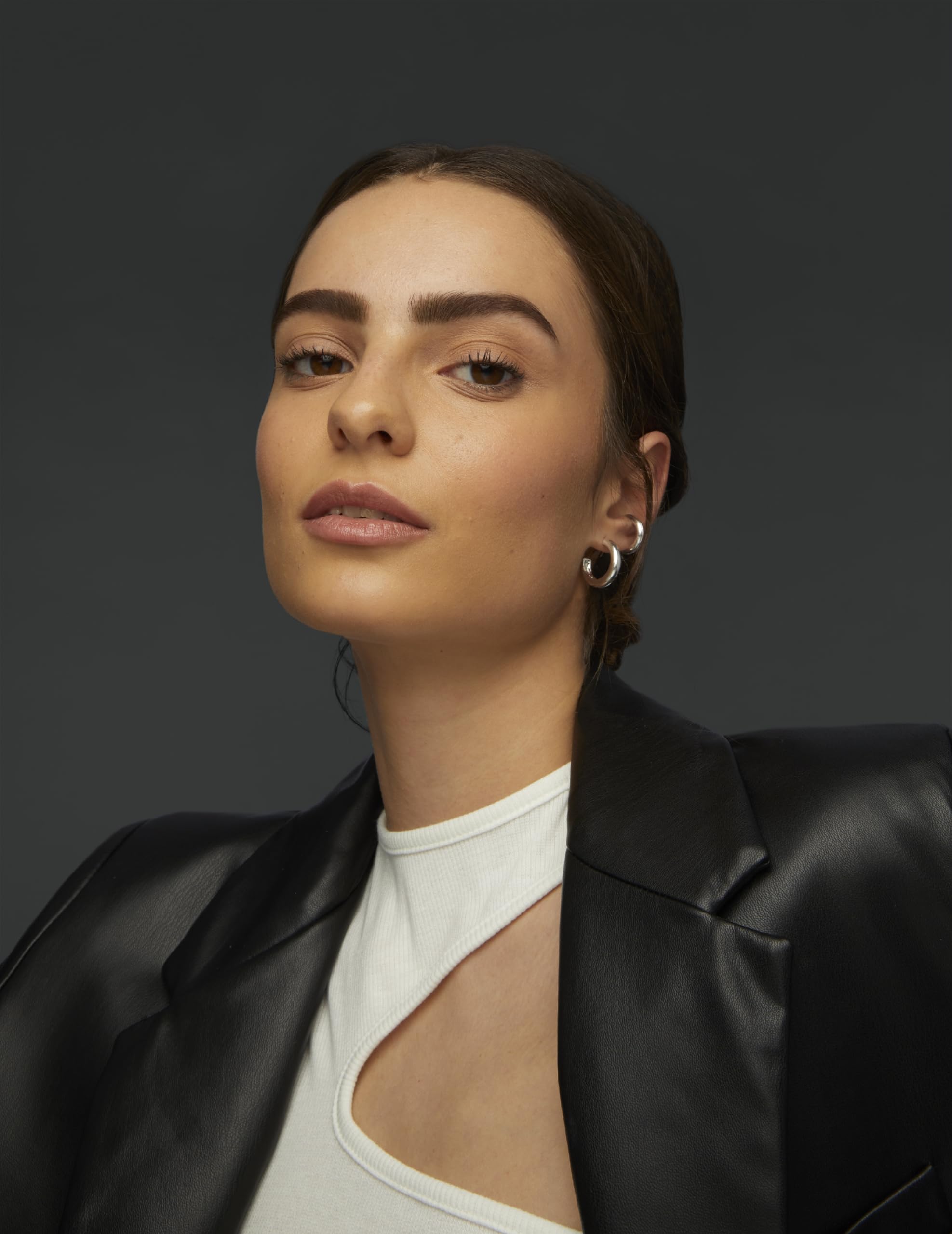 Maybelline Brow Tattoo before-after closeup shows defined brows.