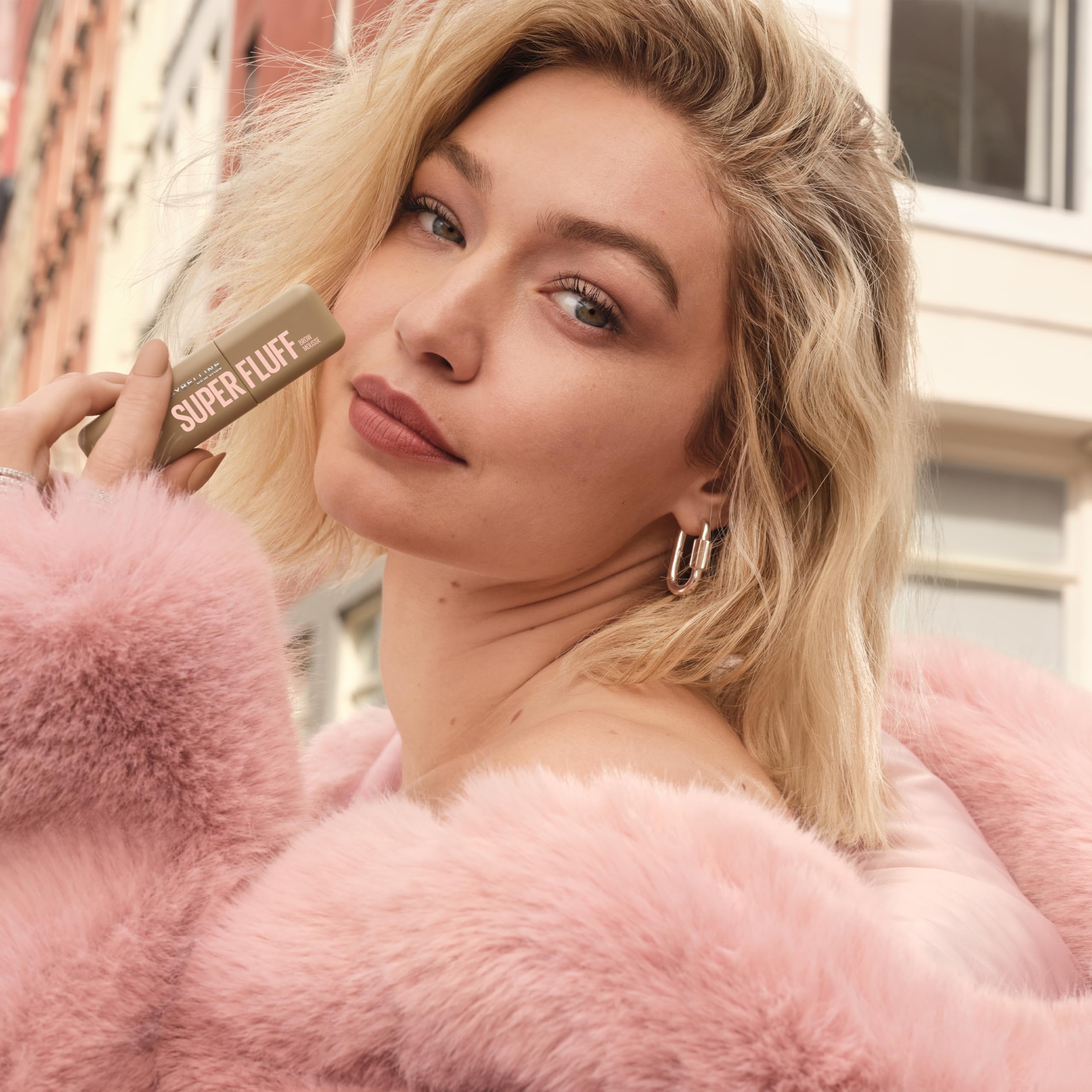 Maybelline Superfluff closeup applying product for easy brow fill.