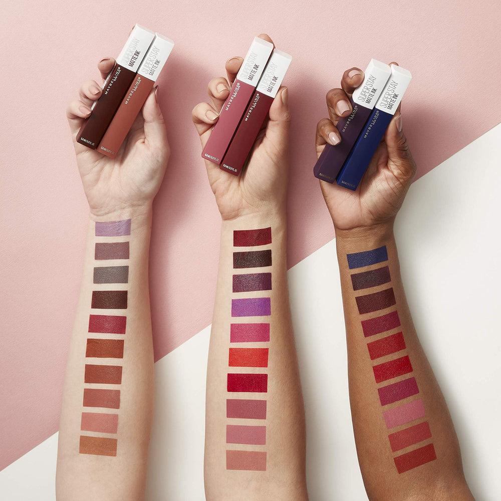Maybelline Super Stay Matte Ink Loyalist shade match on swatch with skin tone.