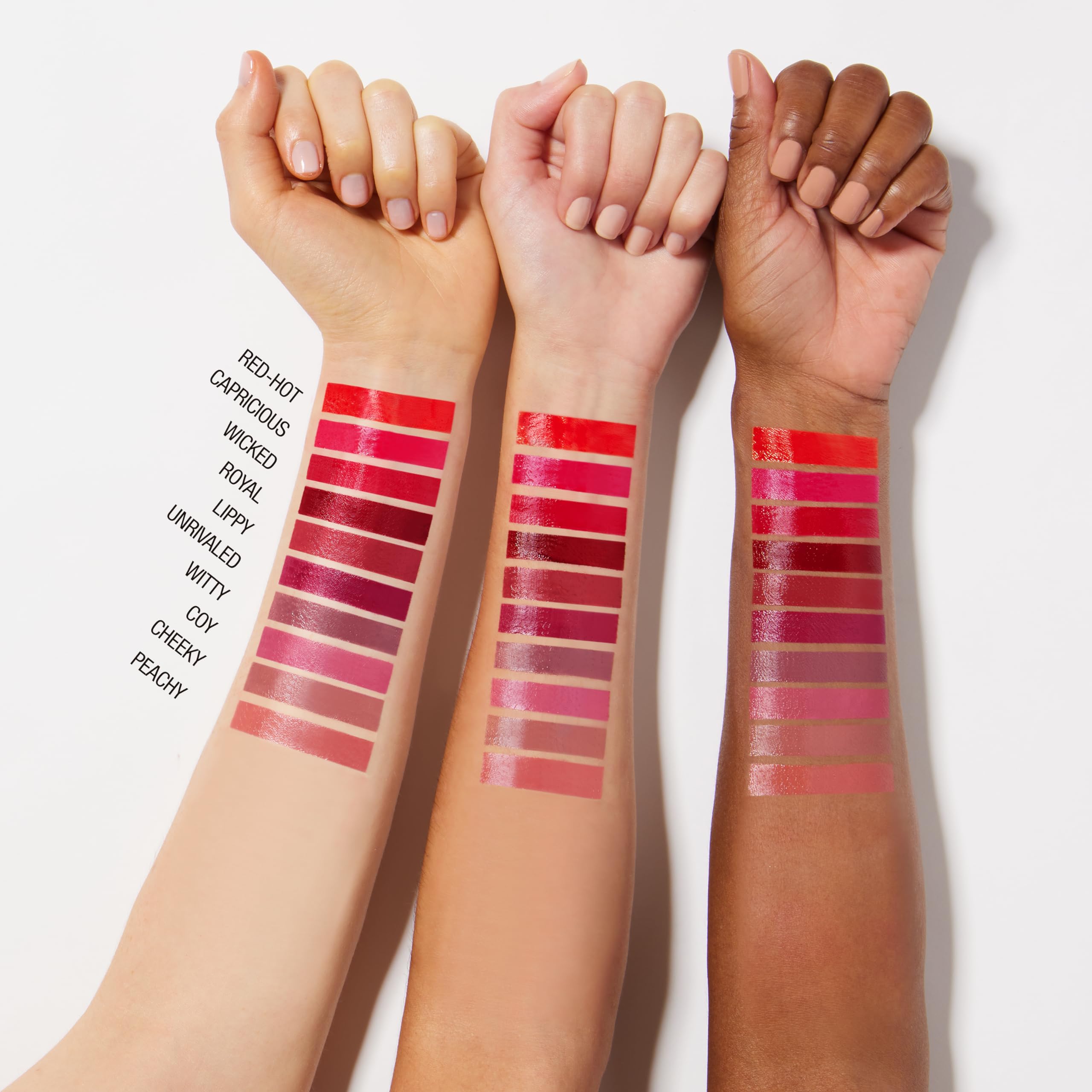 Maybelline Super Stay Vinyl Ink bottle and shade swatches on display