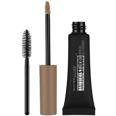 Maybelline TattooStudio spoolie brush close-up delivering even color and defined arches.