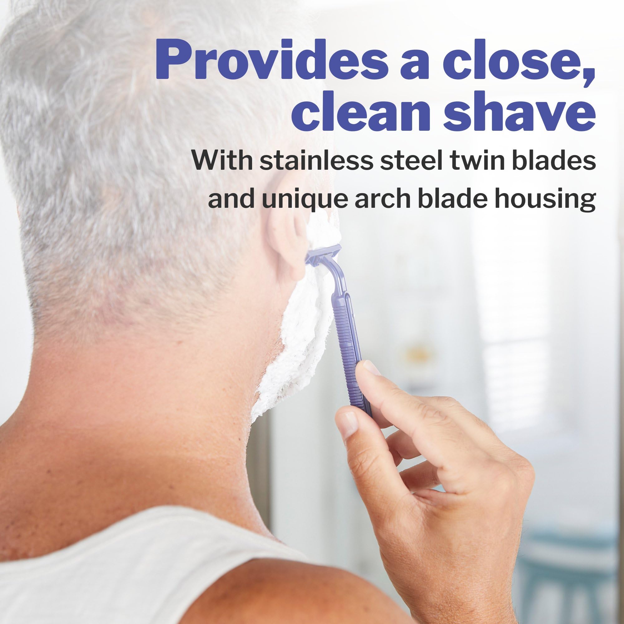 McKesson twin blade precision razor closeup, stainless steel blades for smooth daily shaving.