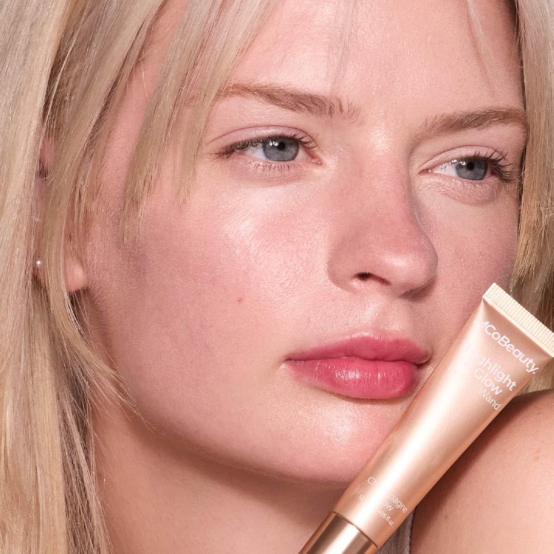 MCoBeauty Soft-focus glow on cheekbone close-up with pearlescent shimmer.