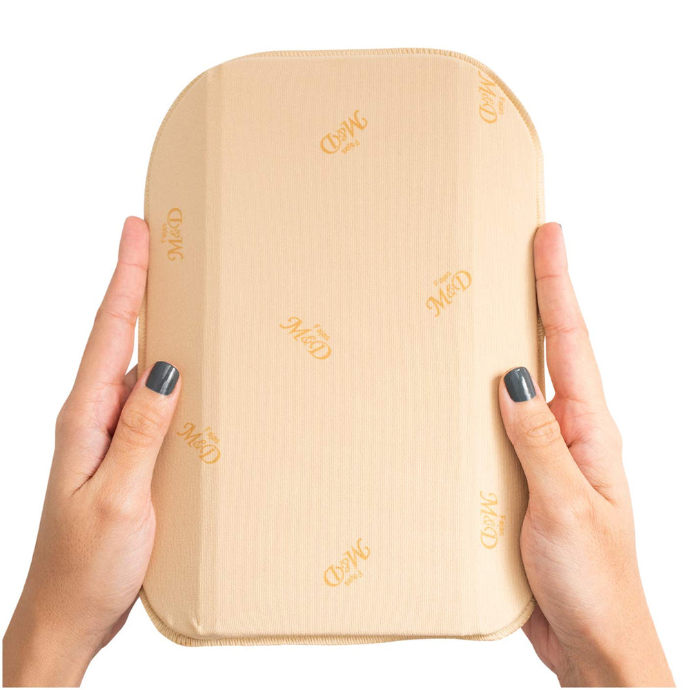 M&D breathable polystyrene with hypoallergenic cotton for gentle skin contact.
