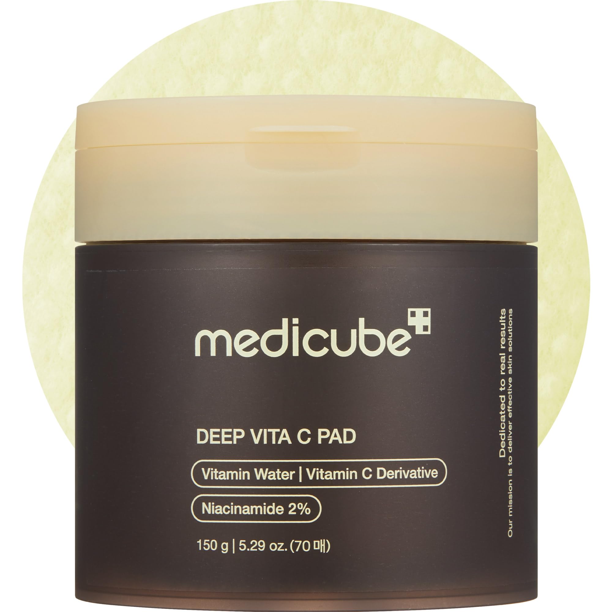 Medicube Deep Vita C Pad embossed side close-up for gentle exfoliation and pore refinement.