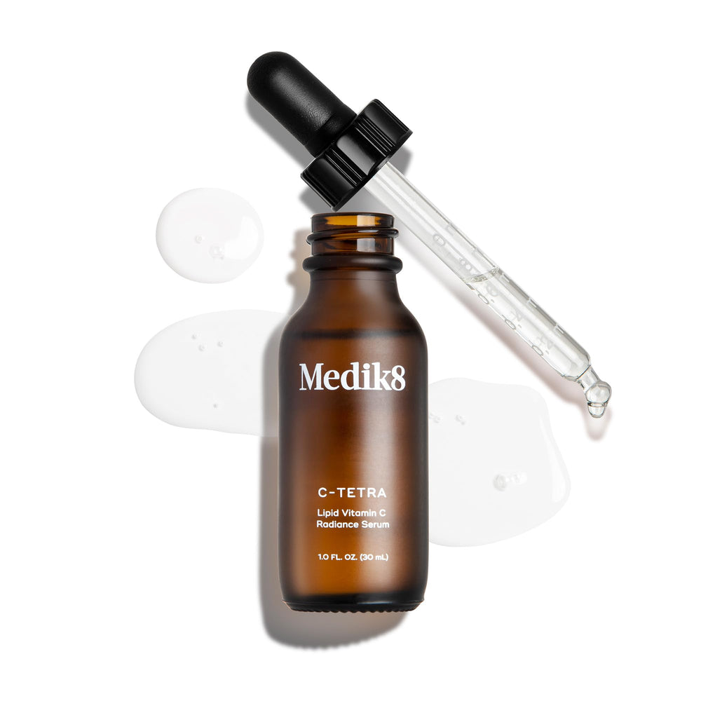 Medik8 C-Tetra vegan and gluten-free label on bottle close-up.