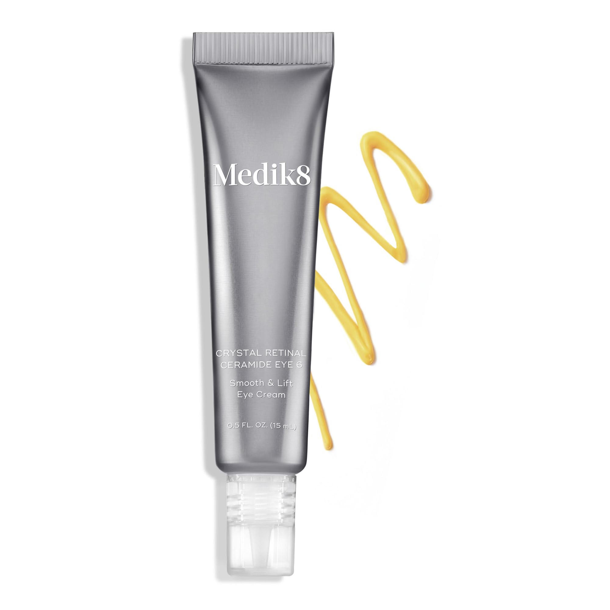 Medik8 Crystal Retinal Eye 6 being applied around the eye for smoother appearance.