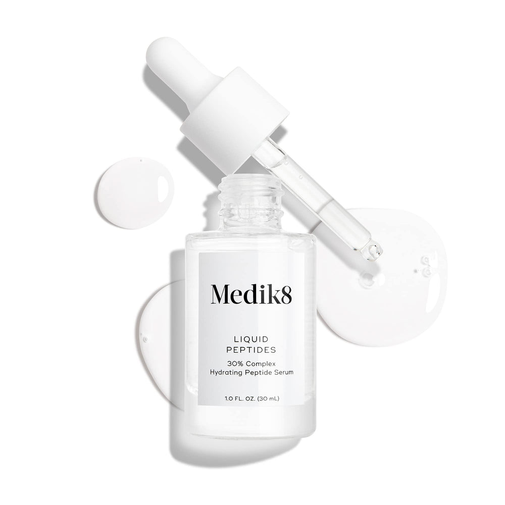 Medik8 Liquid Peptides bathroom routine shot implies daily use and glow enhancement.