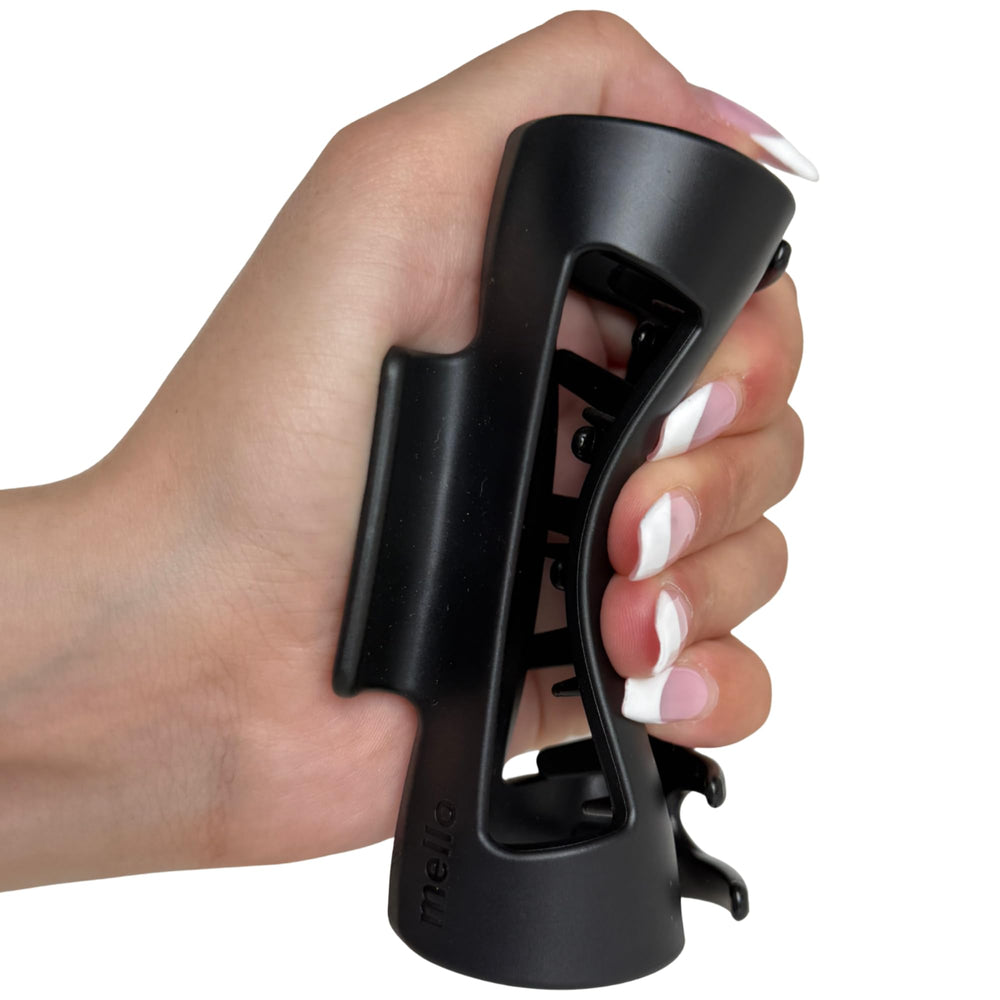 Mello hair clip black side view showcases secure hold without scalp pinching