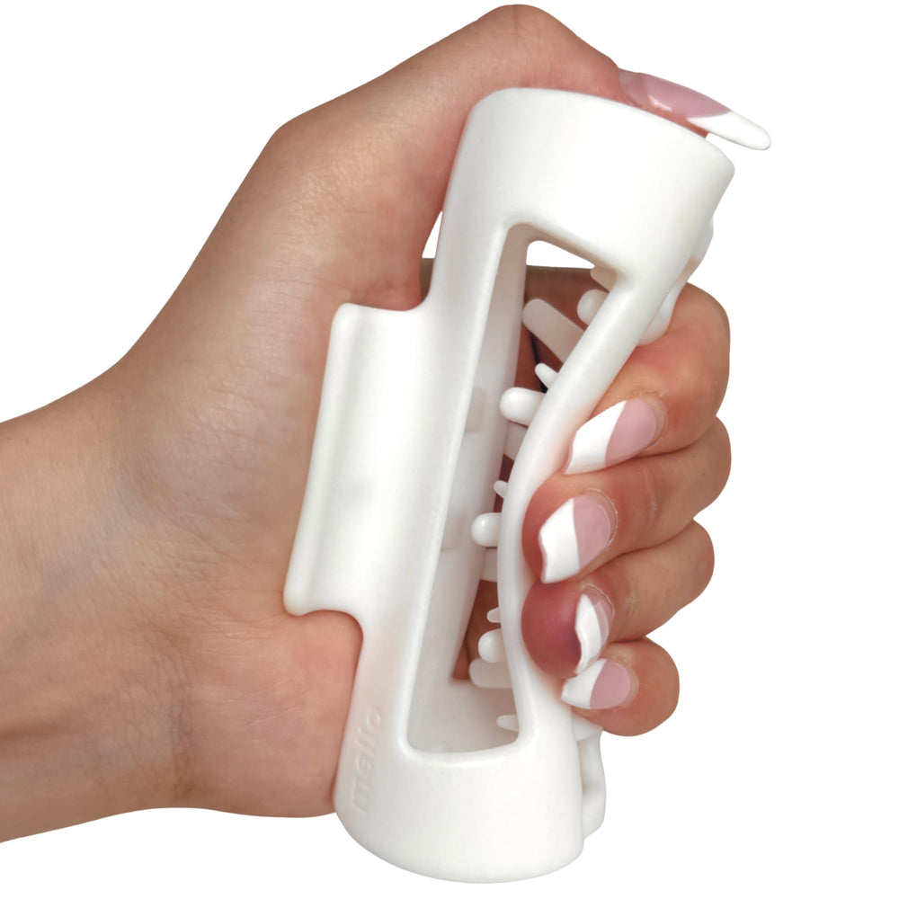 MELLO Original hair-claw clip white close-up shows secure hold.